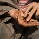Homeless Man Counting Money